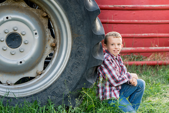 A country boy and his tractor